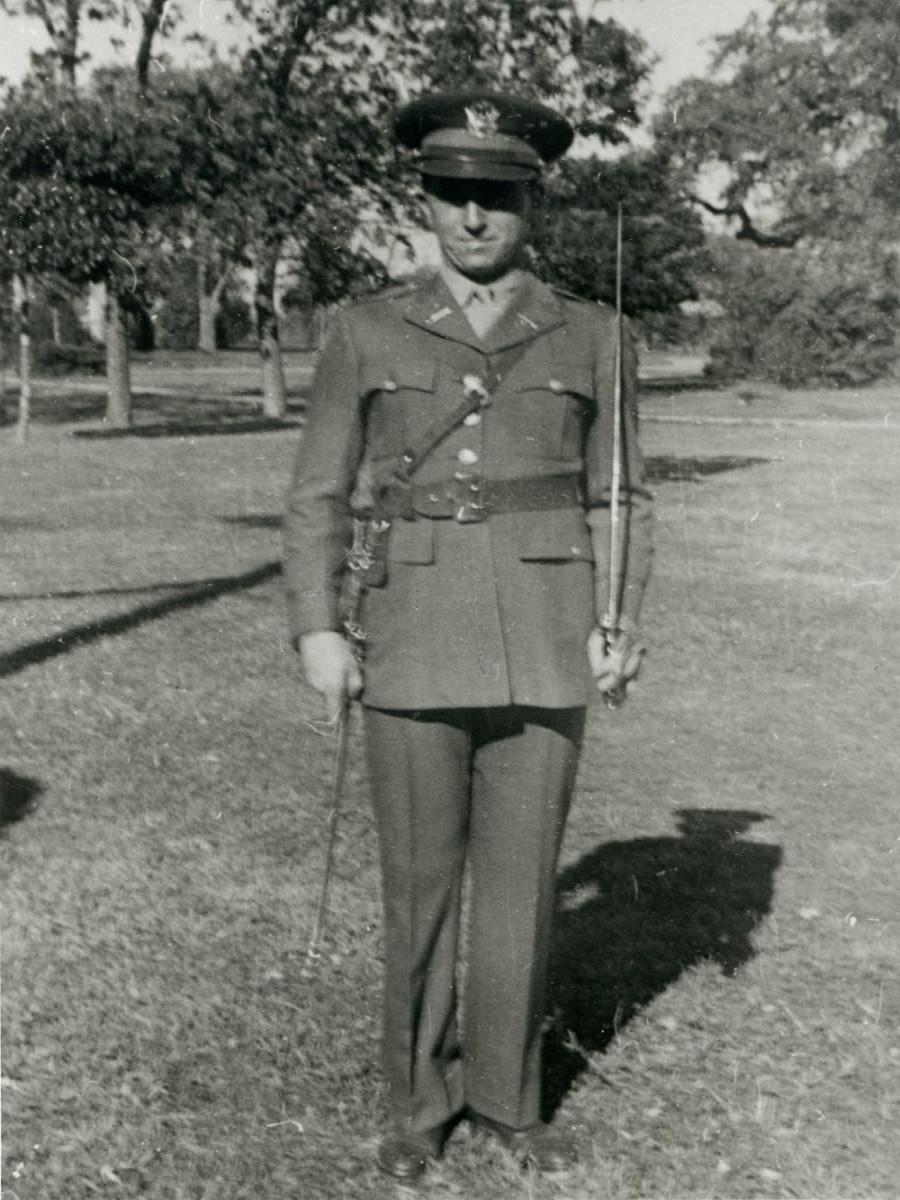 An unidentified officer prepares to lead cadets in drills.